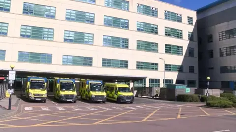 Four ambulances wait outside Great Western's Emergency Department