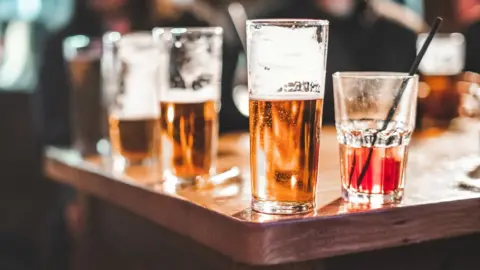 Getty Images Beer glasses on a table