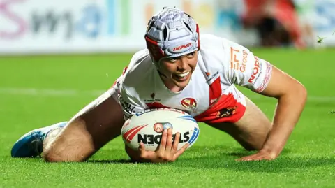 St Helens stand-off George Whitby scores his third try against Catalans Dragons