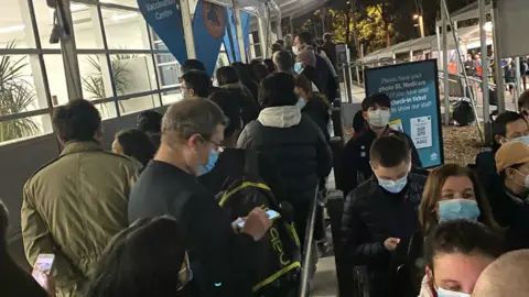 The after-work queue at Sydney's main vaccine hub on Monday