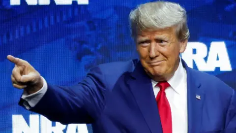 Reuters Former U.S. President Donald Trump speaks at the National Rifle Association (NRA) annual meeting in Indianapolis, Indiana, U.S. April 14, 2023