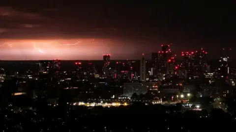 AirMCR_ Lightning over city centre skyscape