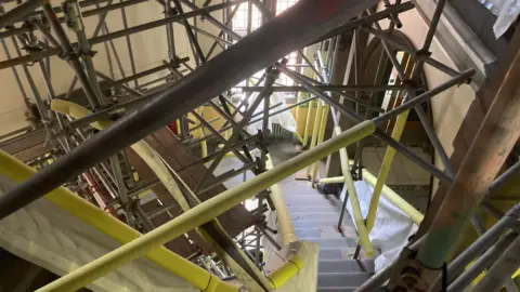 LDRS Scaffolding is up inside County Hall. There is a set of steps leading downstairs.