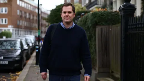 Getty Images Robert Jenrick near his home in central London after resigning as immigration minister in December 2023