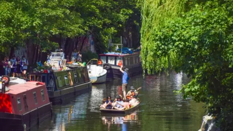 Getty Images People on a boat on the Regent's Canal