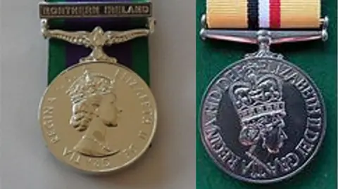Two medals. Both show pictures of Queen Elizabeth II. the medal on the left is golden in colour and Northern Ireland is written on its clasp. The medal on the right is silver.