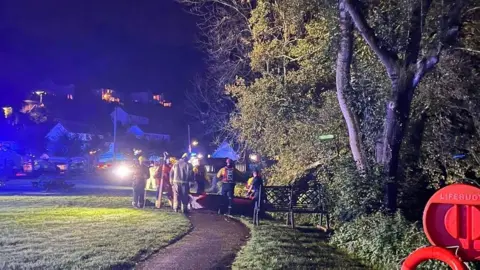 BBC rescuers in a park