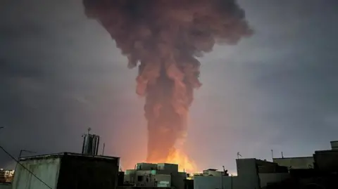 Smoke rises from a fire after a strike on Tehran