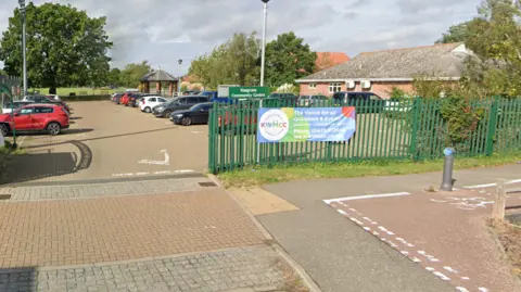 Kesgrave community centre entrance- with green grilled gates 
