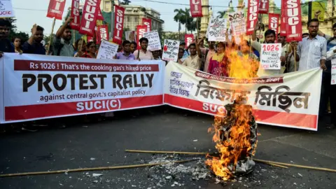 Getty Images A protest against rising gas prices in India