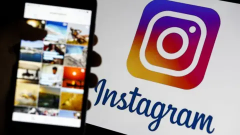 Getty Images/Anadolu Agency The Instagram logo and a phone with photos on it