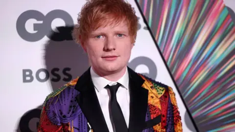 Reuters Ed Sheeran arrives to the GQ Men Of The Year Awards