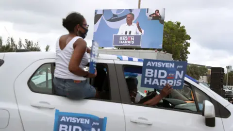 Getty Images Obama stumped for Biden at a drive-in rally