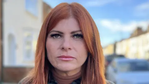 Emma Baugh/BBC News Karina Sanchez, housing compliance officer.