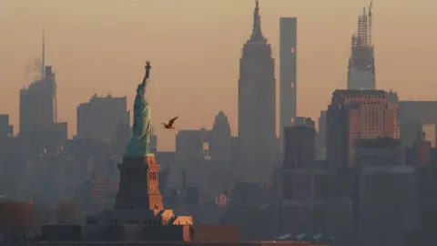 Getty Images The Statue of Liberty has long served as a symbol of US immigration