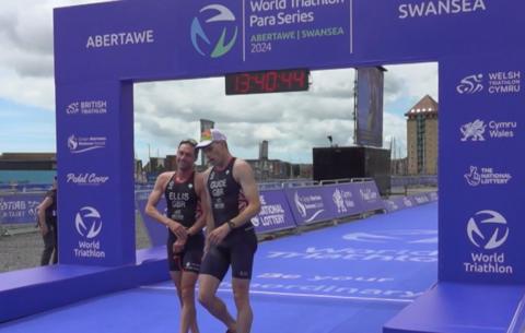 Dave Ellis and Jack Hutchens cross the line in Swansea