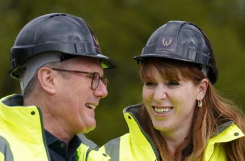Labour leader Sir Keir Starmer and deputy leader Angela Rayner wearing hard hatsh