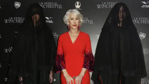 Getty Images Dame Helen Mirren and companions at the premiere of her horror film Winchester