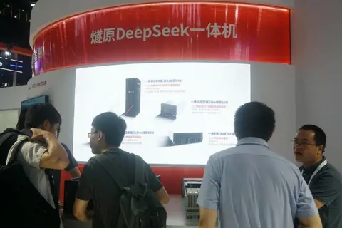 CFOTO/Future Publishing via Getty Images People watch and learn about the Enflame DeepSeek all-in-one machine with DTU 3.0 chip at the 2025 World Artificial Intelligence Conference in Shanghai, China on July 28, 2025.