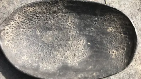 Spoon with bite marks