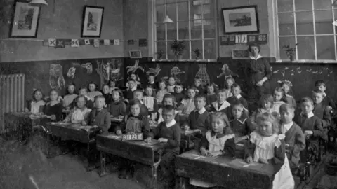 Hearts & Soles Pupils from Alfred Street School in class in 1912