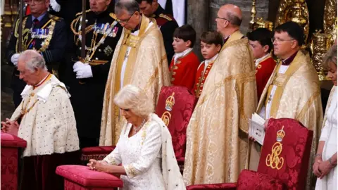 PA Prince George watches King Charles III during the coronation ceremony in Westminster Abbey