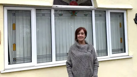 Marianne Phillips Marianne Phillips outside her home
