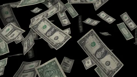 Getty Images Stock picture of falling US dollars