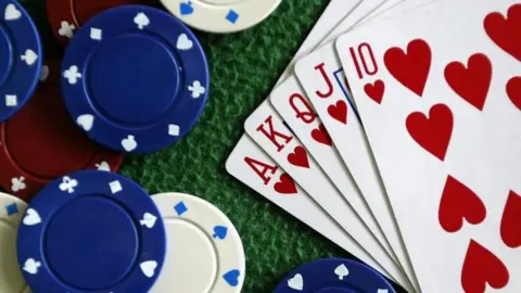 AFP Playing cards and gambling chips