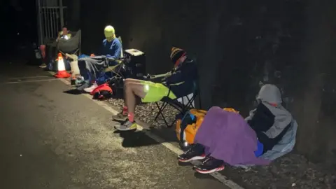 Reuters Runners resting during the ultramarathon