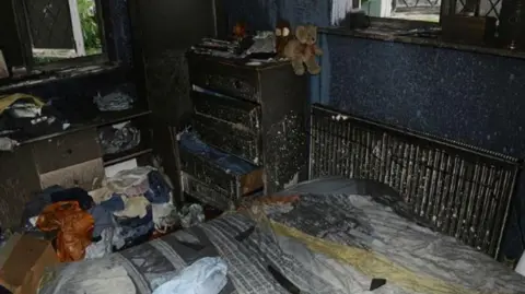 Cambridgeshire Constabulary Burnt bed along with clothes and other items