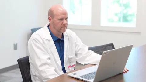 Colin McCawley SCETV Pediatrician Stuart Simko has a telehealth session