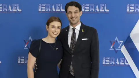 Yaron Lischinsky and Sarah Milgrim pictured together at a work event