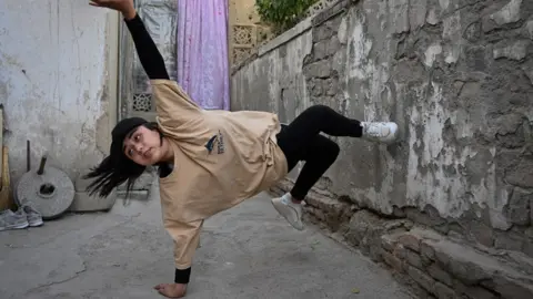 Getty Images Manizha training at home after the club she used to practise at was closed down due to security threats