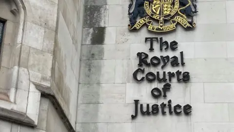 Brian Farmer/BBC Sign saying Royal Courts of Justice