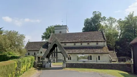 Google A Google Maps image of Betchworth Church building and archway as seen from the carpark