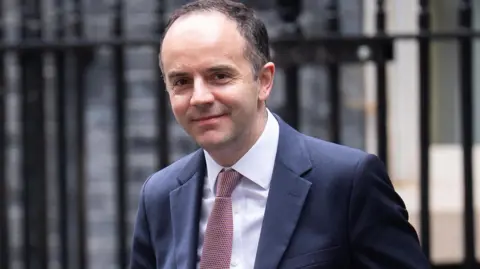 A close up shot of health secretary James Murray