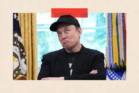 Getty Images Elon Musk with his arms folded 