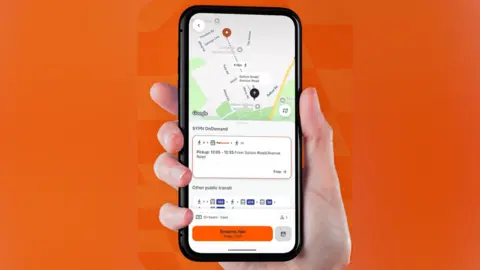 South Yorkshire Mayoral Combined Authority An image of a hand holding a smartphone with the On Demand app open