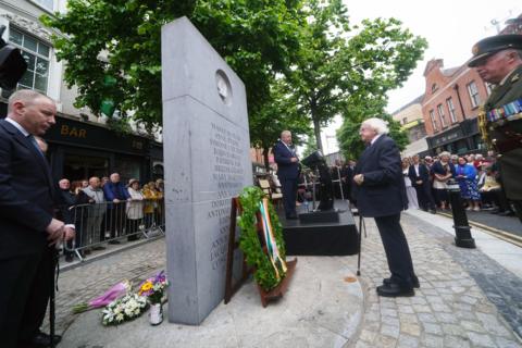 President of Ireland Michael D Higgins lays a wreath during a ceremony at the Memorial to the victims of the Dublin and Monaghan bombings on Talbot Street in Dublin, to mark the 50th anniversary of the Dublin and Monaghan bombings. 