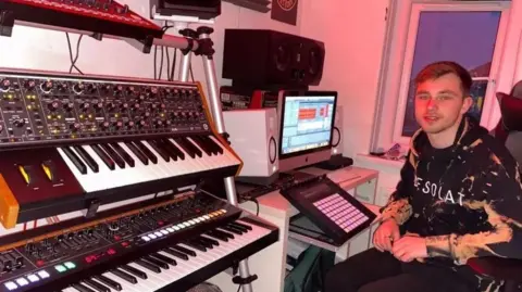 Nath Brown Nath Brown mixes his tracks in his home studio