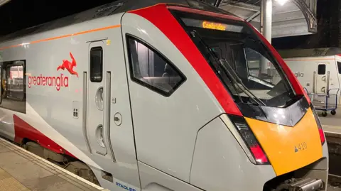 Two Greater Anglia trains at Norwich station.