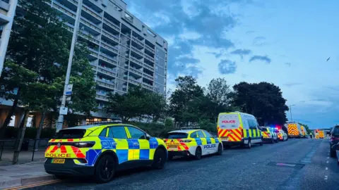 Numerous police vehicles at the scene of an incident in Aberdeen.