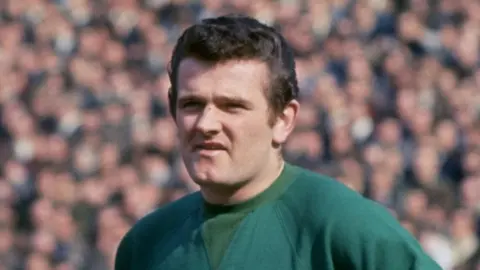 Allsport/Getty Images Tommy Lawrence