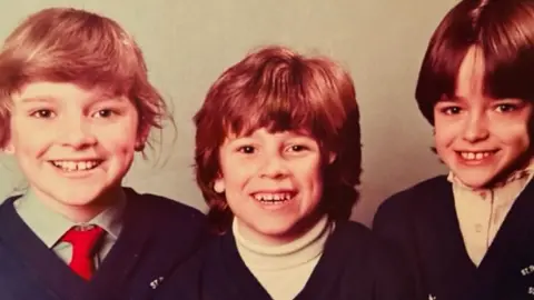 Gabby Logan with brother Daniel and sister Louise