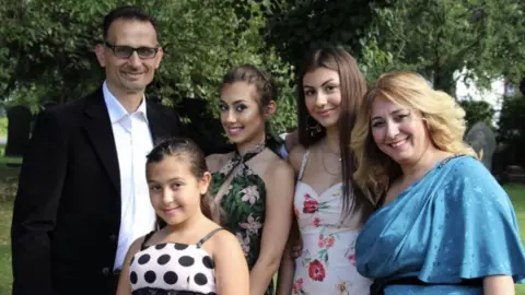 Esther Esther with her family