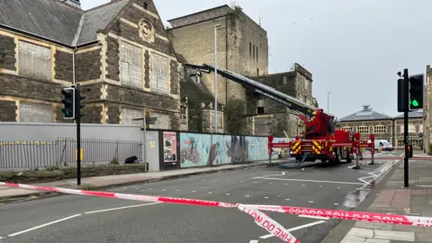 A fire engine outside the Mechanics' Institute in Swindon.
