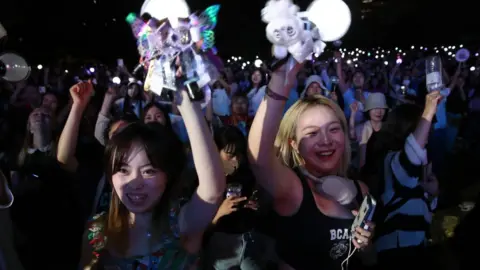 Getty Images Fans hold a party to celebrate BTS' 10th anniversary in June 2023