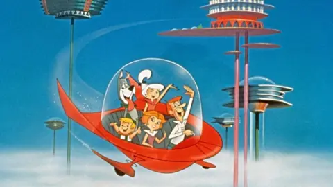 Warner bros via Getty Images Still show the Jetsons family
