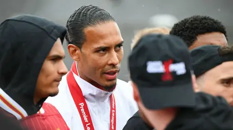 Liverpool captain Virgil van Dijk on the club's Premier League trophy parade